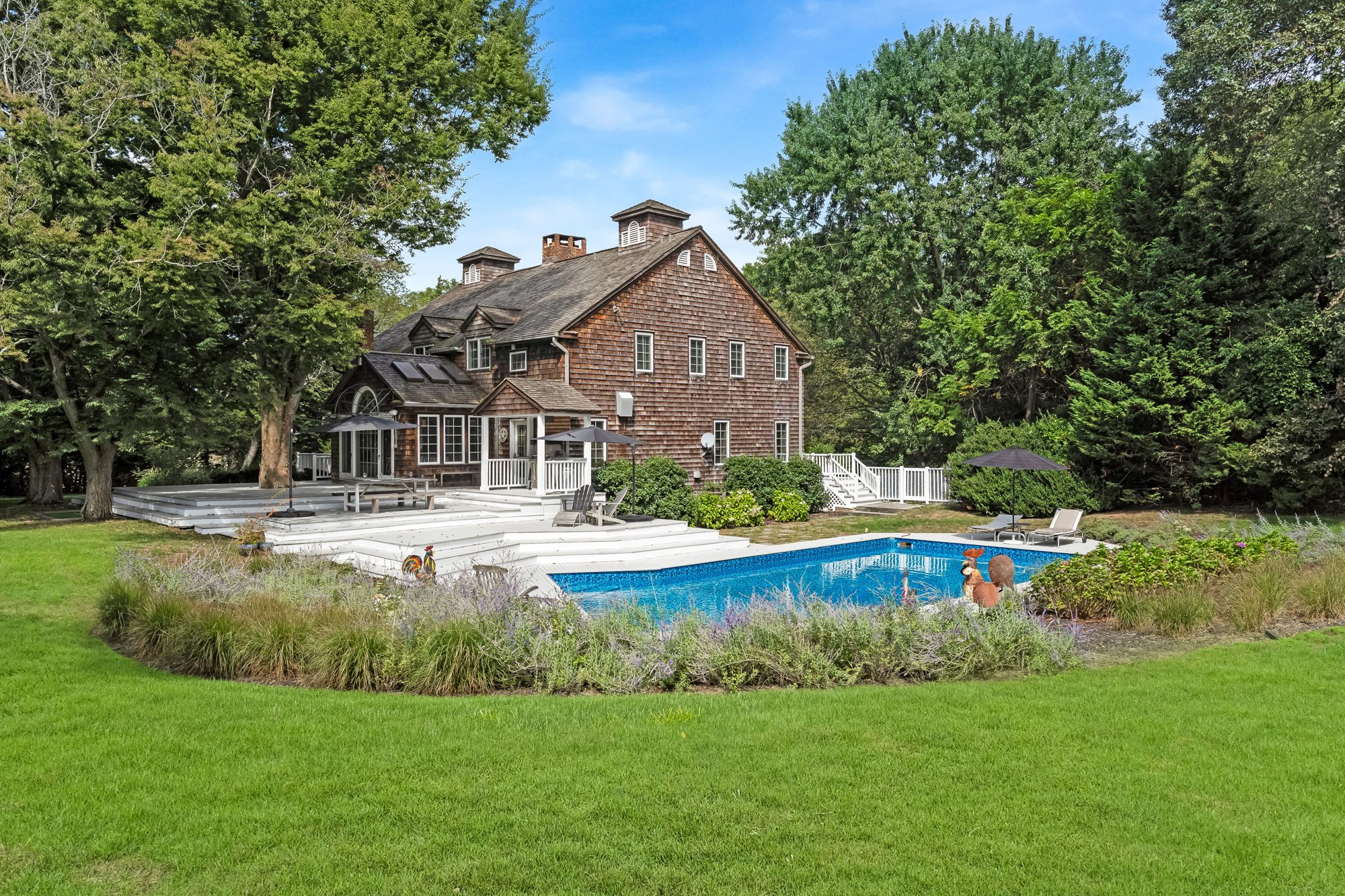 Shingle-style home with pool and gardens, Riverhead
